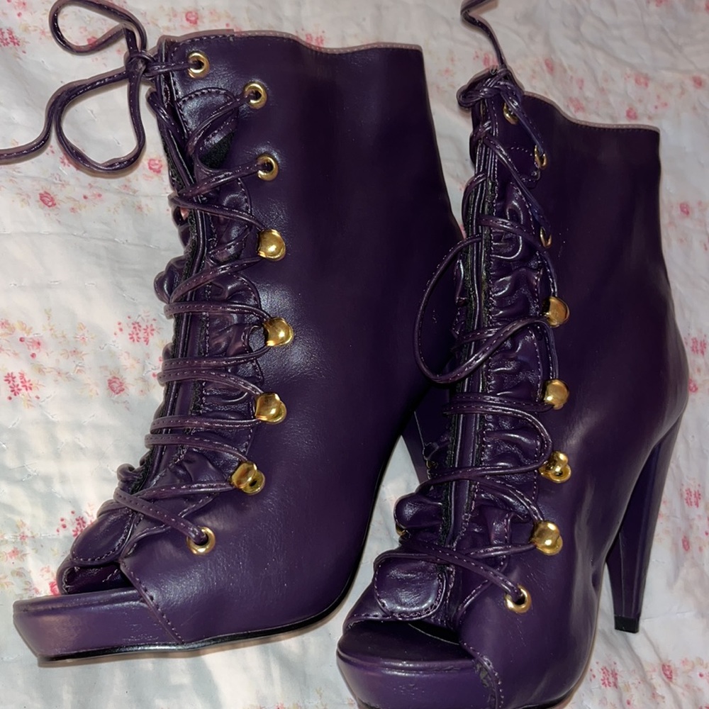 Breckelle’s purple lace up ruffle Amber bootie